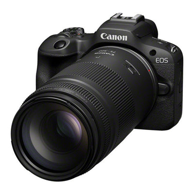 Canon EOS camera with lens on a white background