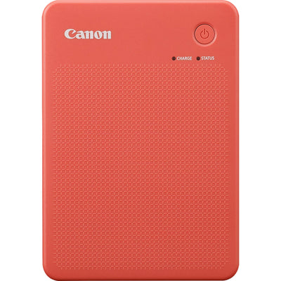 Canon SELPHY Square QX20 portable photo printer in terracotta red, compact rectangular body with integrated paper slot.