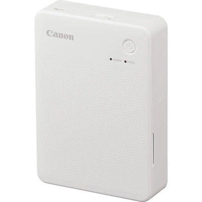 Canon SELPHY Square QX20 portable photo printer in white – compact rectangular device with USB-C port and photo output slot.