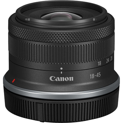 Canon EOS R50 Creator Kit with camera, mic, tripod grip, and 18-45mm lens.
