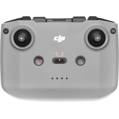 A black DJI RC-N3 drone remote controller is displayed, featuring two joysticks and a retractable smartphone mount on top.