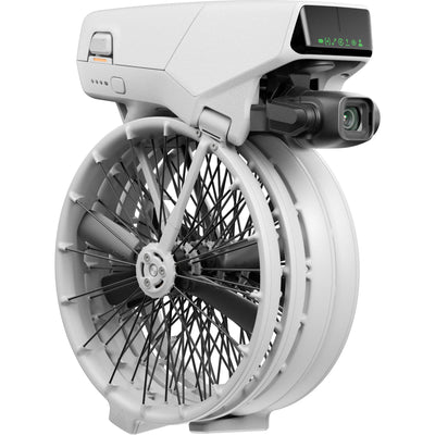 White electric bike wheel with electronic components on a white background