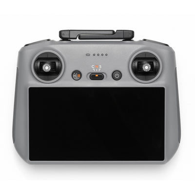 Gray drone remote control with screen and buttons on a white background