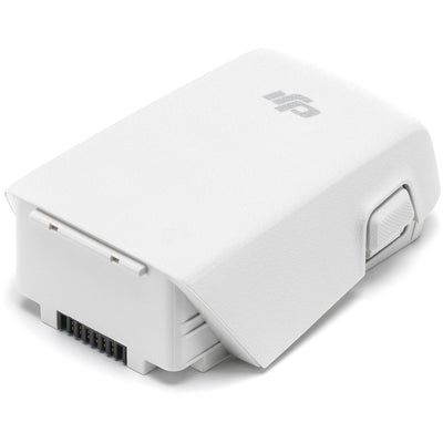 A black DJI Intelligent Flight Battery is shown, featuring a power button and four LED indicators.