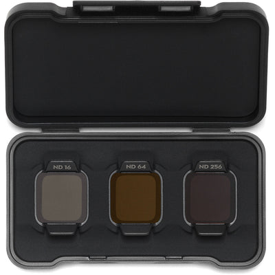 A set of three square DJI Avata 2 ND filters are displayed inside a small, black case.