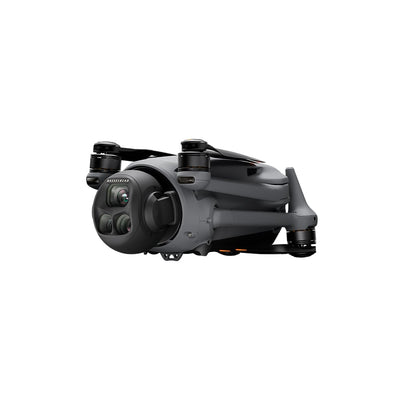 A grey DJI Mavic 4 Pro drone is shown from the front with its four arms extended and its triple-camera system visible