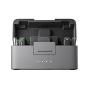 DJI Mic Mini wireless microphone with dual transmitters, compact charging case, noise cancellation, and long battery life for content creators.