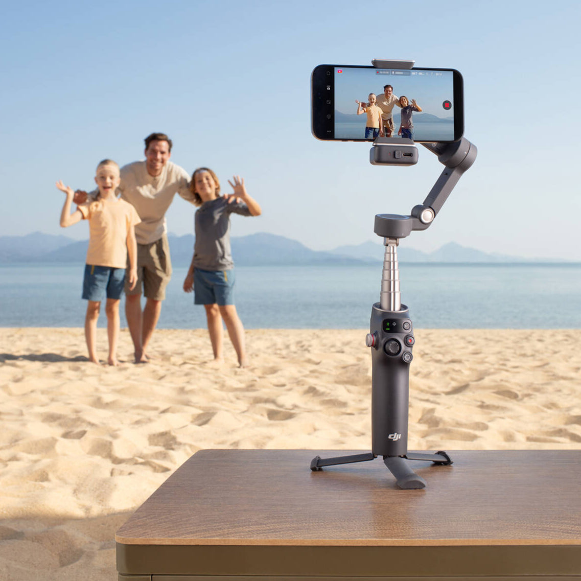DJI Osmo Mobile 7P smartphone gimbal with tripod and fill light