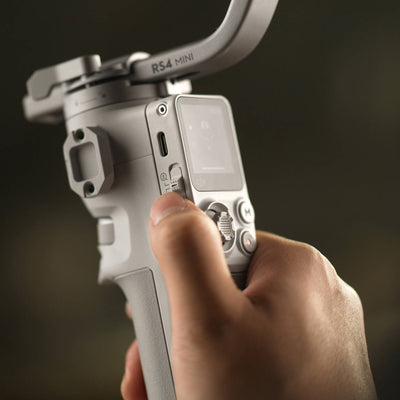 DJI RS 4 Mini Gimbal Stabiliser – lightweight 3-axis stabilizer designed for mirrorless cameras, offering smooth footage, compact design, and advanced shooting modes.