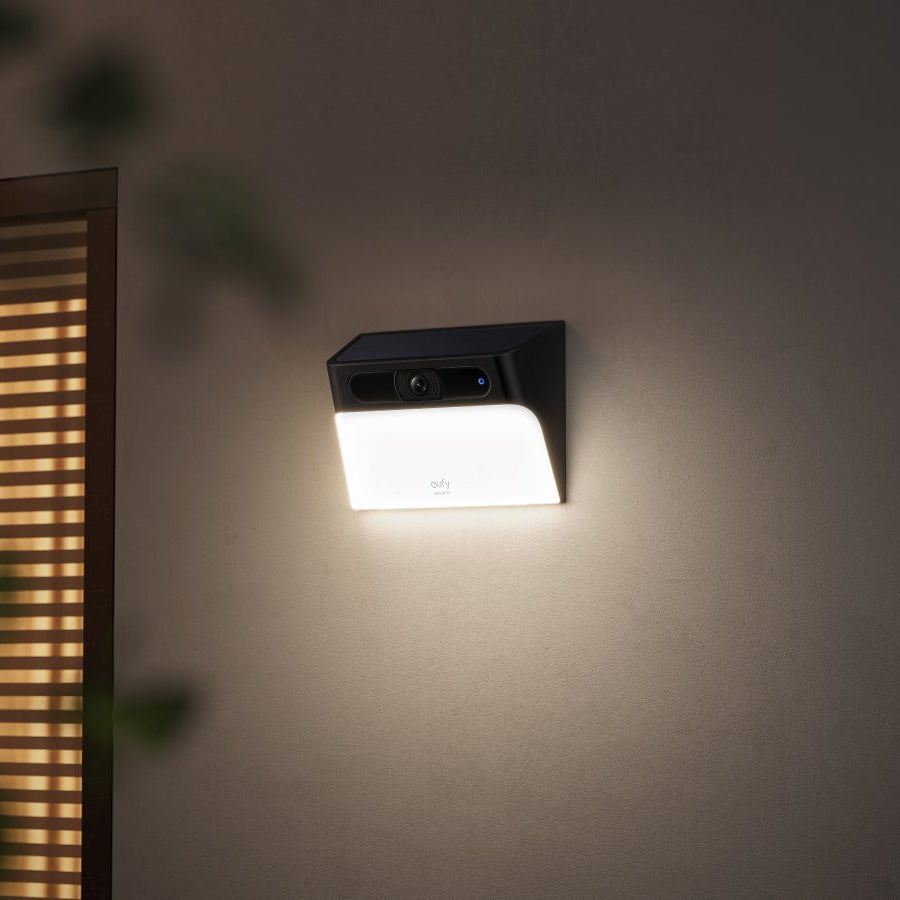 Eufy Wall Light Solar Cam S120 - sleek black outdoor wall-mounted security light with integrated solar panel and camera.