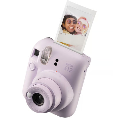 Purple instant camera with a photo on the display against a white background