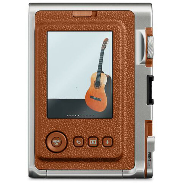 Fujifilm Instax Mini Evo Instant Film Camera (Brown) – stylish hybrid instant camera with retro brown design, digital display, lens and film effects, and instant printing.