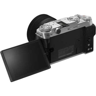 Fujifilm X-M5 silver mirrorless camera with XC 15-45mm f/3.5-5.6 OIS PZ compact zoom lens featuring 23-69mm equivalent focal length, 3-stop optical image stabilization, and smooth electric zoom