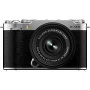 Fujifilm X-M5 silver mirrorless camera with XC 15-45mm f/3.5-5.6 OIS PZ compact zoom lens featuring 23-69mm equivalent focal length, 3-stop optical image stabilization, and smooth electric zoom