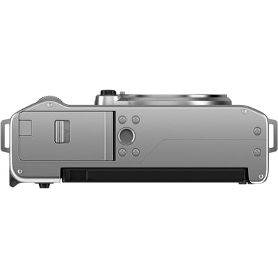 Fujifilm X-M5 silver mirrorless camera with XC 15-45mm f/3.5-5.6 OIS PZ compact zoom lens featuring 23-69mm equivalent focal length, 3-stop optical image stabilization, and smooth electric zoom