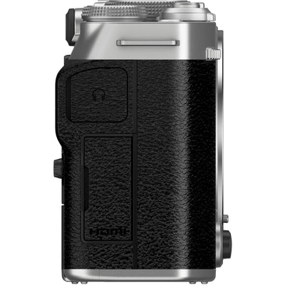 Fujifilm X-M5 silver mirrorless camera with XC 15-45mm f/3.5-5.6 OIS PZ compact zoom lens featuring 23-69mm equivalent focal length, 3-stop optical image stabilization, and smooth electric zoom