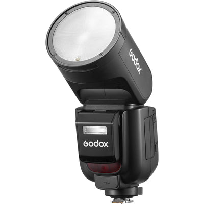 Godox V1 Pro round-head speedlight for Sony, featuring a circular flash head, detachable sub-flash module, and lithium-ion battery grip.