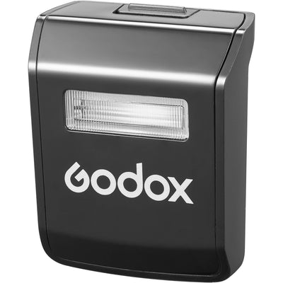 Godox V1 Pro round-head speedlight for Sony, featuring a circular flash head, detachable sub-flash module, and lithium-ion battery grip.