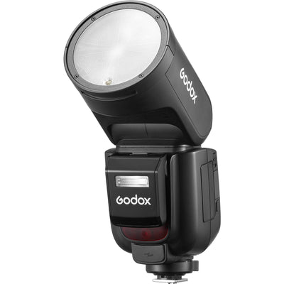 Godox V1 Pro round-head speedlight for Fujifilm—circular flash head with detachable sub-flash, modeling LED, and lithium-ion battery grip.