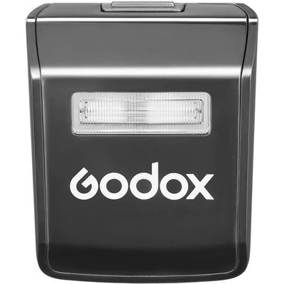 Godox V1 Pro round-head speedlight for Nikon — circular TTL flash head with detachable sub-flash, built-in modeling LED, and rechargeable lithium-ion battery grip.