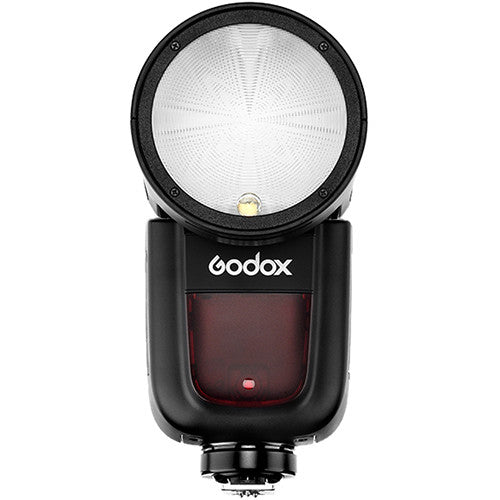 Godox V1-F round-head speedlight for Fujifilm — compact flash unit with circular flash head, LCD panel, and removable lithium-ion battery.