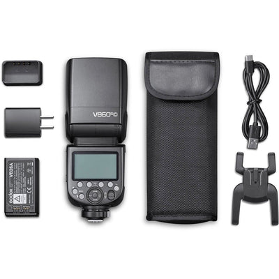 Godox V860 III speedlight for Canon, black flash unit with flip-up head, display panel, removable lithium battery, and accessories.