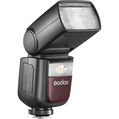 Godox V860 III speedlight for Nikon — black flash unit with tilting head, LCD display, and removable lithium-ion battery.