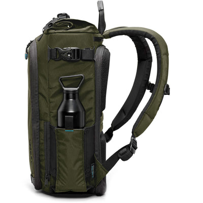 Forest Green Kiboko City Commuter 18L backpack side view showing the bottle pocket