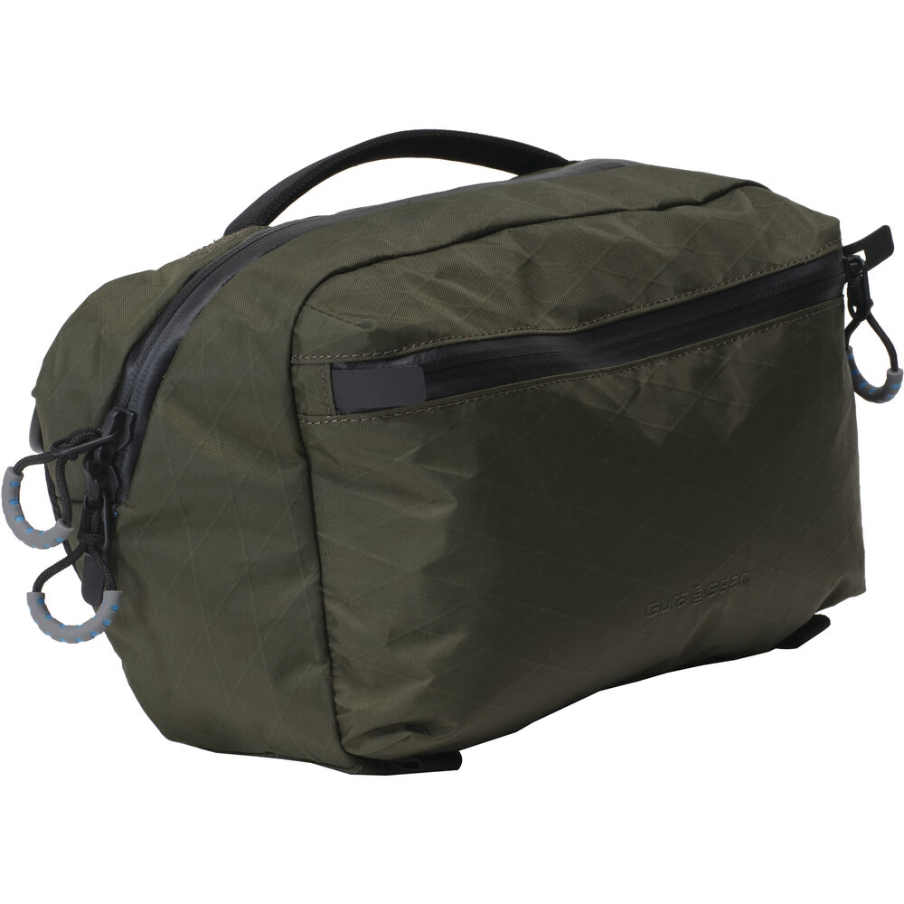 Gura Gear 6L green camera sling bag angled view