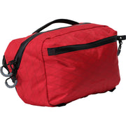 Red toiletry bag with black zippers on a white background