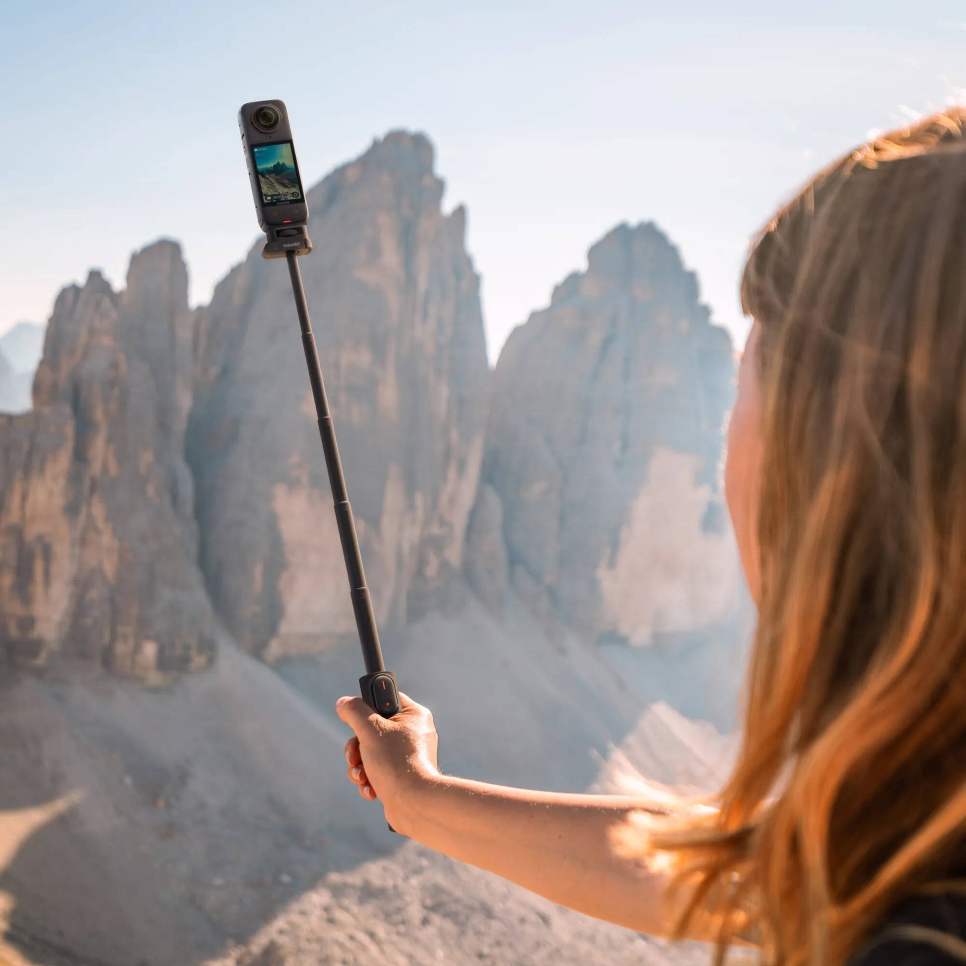 Insta360 Foldable 2-in-1 Selfie Stick with tripod design
