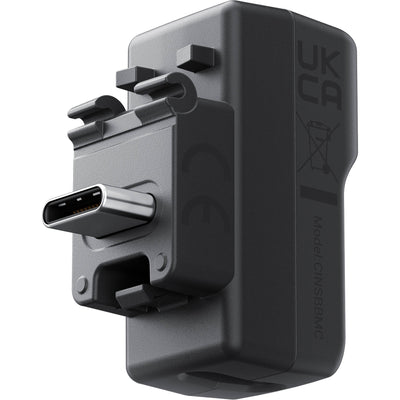 Black USB-C adapter on a white background