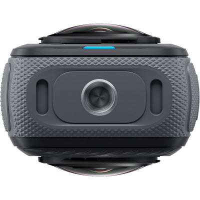Insta360 X4 360° action camera in black with touchscreen display, bundled with motorcycle mounting accessories including heavy‑duty clamp, flexible adhesive mounts, invisible selfie stick, lens guards, thumb screws, and a 128 GB microSD card.