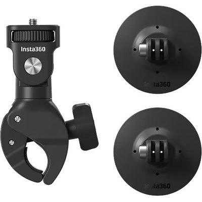 Insta360 X4 360° action camera in black with touchscreen display, bundled with motorcycle mounting accessories including heavy‑duty clamp, flexible adhesive mounts, invisible selfie stick, lens guards, thumb screws, and a 128 GB microSD card.