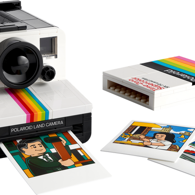 LEGO Ideas Polaroid OneStep SX-70 Camera set with 516 pieces, features a realistic build with working viewfinder, iconic Color Spectrum, turnable exposure dial, shutter button, and brick-built film pack that ejects photos