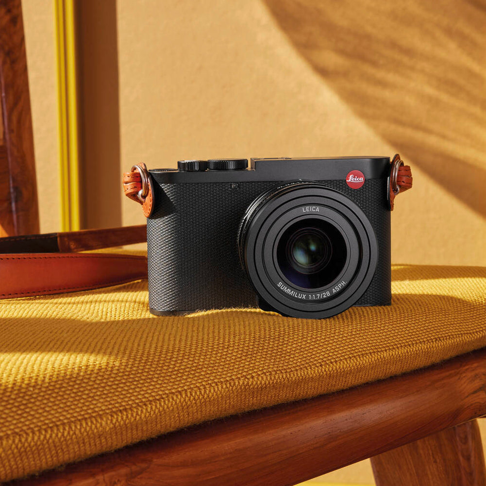 Leica Q3 camera with 60MP sensor and 8K video recording.