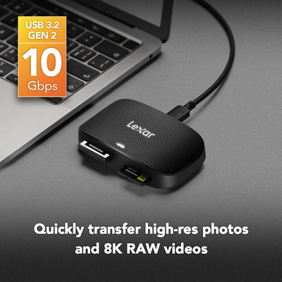 Lexar USB 3.2 Gen 2 device connected to a laptop on a gray surface.