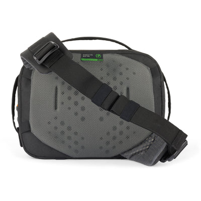 Eco-friendly Lowepro Trekker Lite SLX 120 camera bag with padded compartments and accessories
