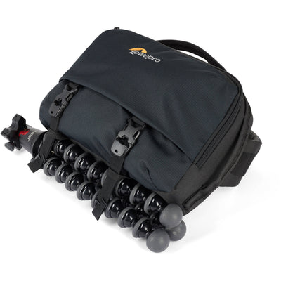 Eco-friendly Lowepro Trekker Lite SLX 120 camera bag with padded compartments and accessories
