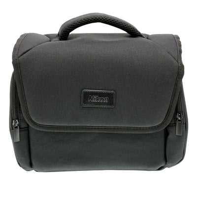 Black Nikon shoulder bag for camera, lenses, and accessories with padded interior.