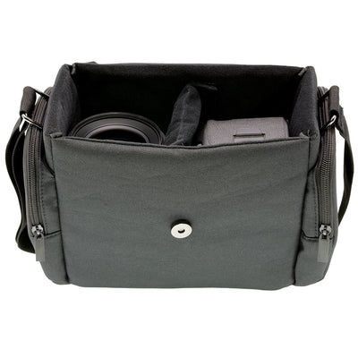 Black Nikon shoulder bag for camera, lenses, and accessories with padded interior.
