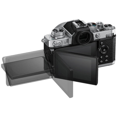 Nikon Z FC mirrorless camera with 20.9MP DX sensor and compact 16-50mm f/3.5-6.3 VR lens, 4K video, and hybrid autofocus.