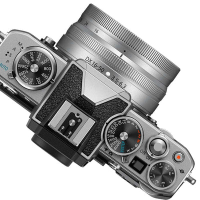 Nikon Z FC mirrorless camera with 20.9MP DX sensor and compact 16-50mm f/3.5-6.3 VR lens, 4K video, and hybrid autofocus.
