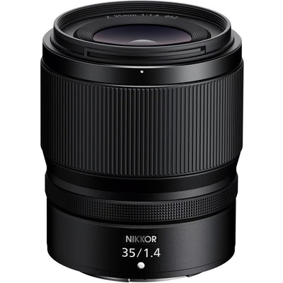 Nikon Z50 II mirrorless camera kit in black with three attached NIKKOR Z lenses (16–50 mm, 50–250 mm, and 35 mm prime), featuring a 3.2‑inch tilting touchscreen, built-in electronic viewfinder, and ergonomic textured grip.