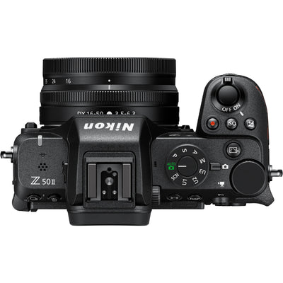 Nikon Z50 II mirrorless camera kit in black with three attached NIKKOR Z lenses (16–50 mm, 50–250 mm, and 35 mm prime), featuring a 3.2‑inch tilting touchscreen, built-in electronic viewfinder, and ergonomic textured grip.