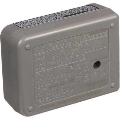 Olympus BCS-5 dedicated lithium-ion battery charger for BLS-5 and BLS-50 batteries, compatible with 100-240V AC international power supplies.