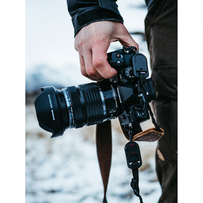 OM System OM-1 mirrorless camera with 20MP stacked BSI Live MOS sensor, TruePic X processor, 5-axis IBIS delivering up to 8 stops, 120fps EVF, 4K 60p video, and rugged IP53 weather-sealed body.