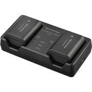 Olympus SBCX-1 kit includes one BLX-1 2280mAh lithium-ion battery and BCX-1 dual battery charger, charges two batteries simultaneously in about 150 minutes via USB-C with power delivery