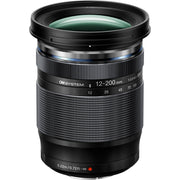 OM SYSTEM 12-200mm f/3.5-6.3 mirrorless lens showing full zoom range, compact design, and weather-sealed build.