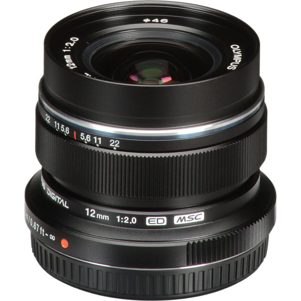 M.Zuiko Digital ED 12mm f/2 wide-angle prime lens for Micro Four Thirds cameras, shown on a mirrorless camera body.
